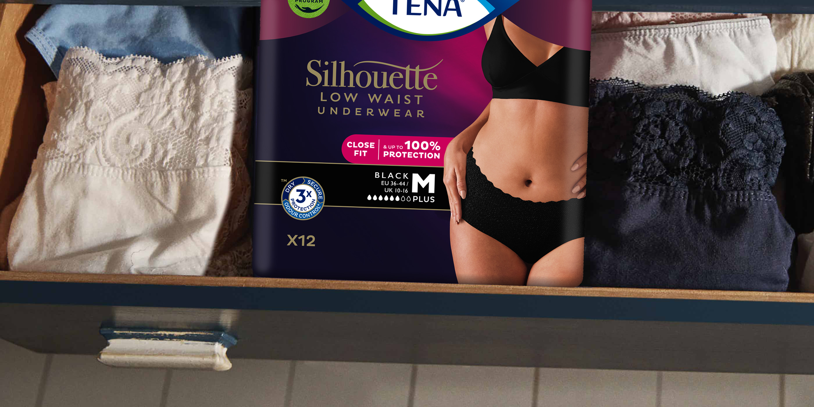 Szuflada z bielizną i paczką bielizny chłonnej TENA Silhouette Szuflada z bielizną i paczką bielizny chłonnej TENA Silhouette